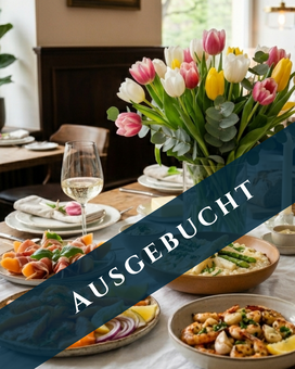 A beautifully set table with salmon, shrimp, asparagus risotto, and more for Mother's Day. "Sold Out" banner