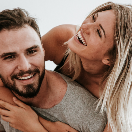 Couple hugging each other.