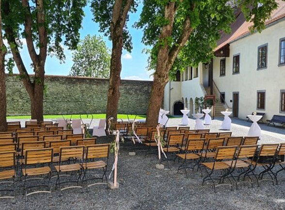 Wedding setting in the castle courtyard 