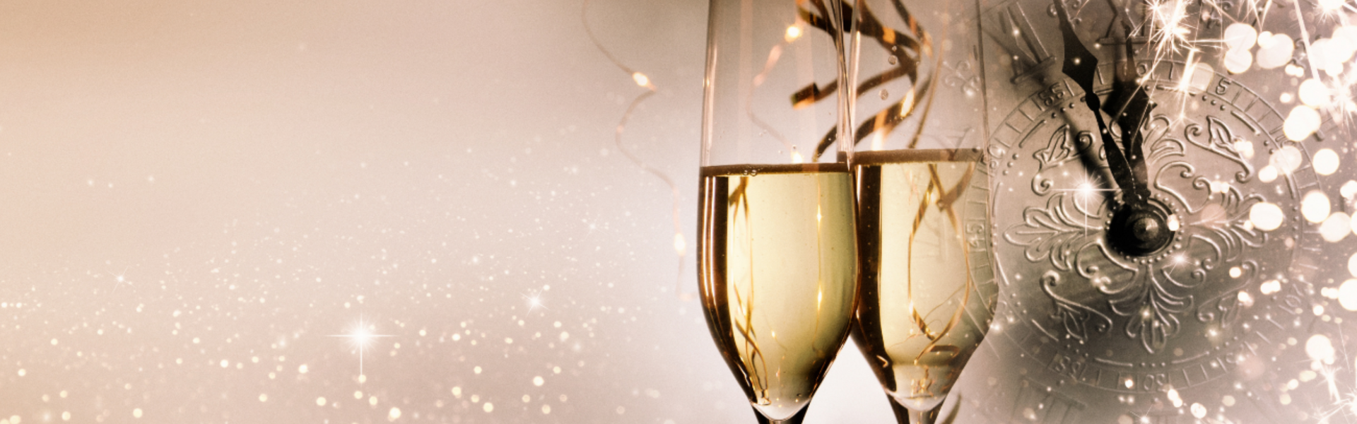 Champagne glasses and clock