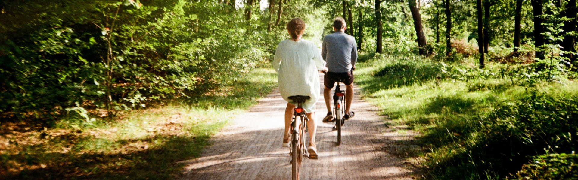Cyclists Approaching from Behind in the Woods