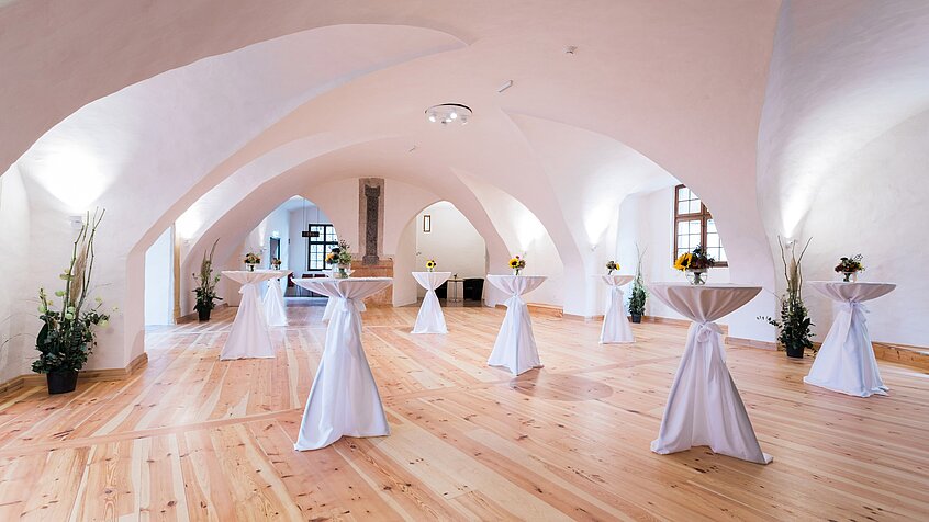 Knights' Hall with bar tables at Schlaining Castle.