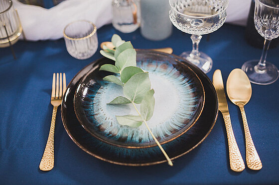 Festively laid table at a wedding.