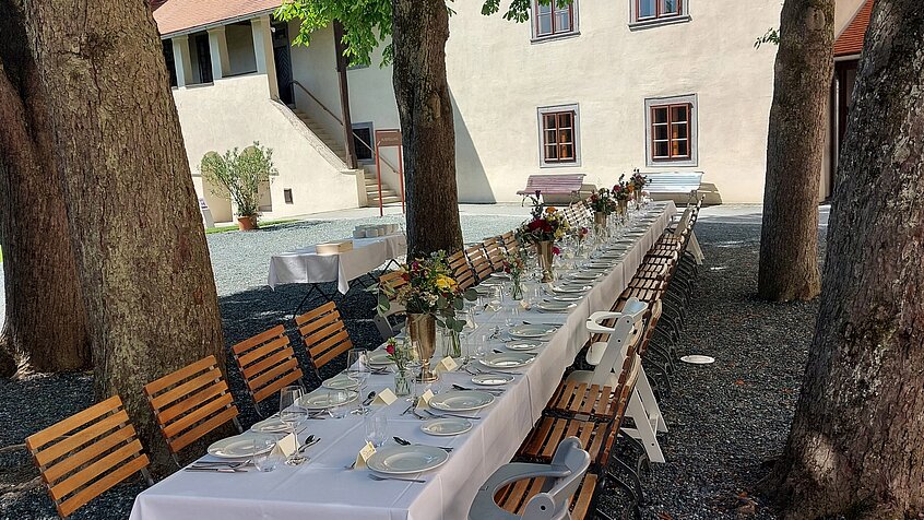 Set table in the inner courtyard of Schlaining Castle.